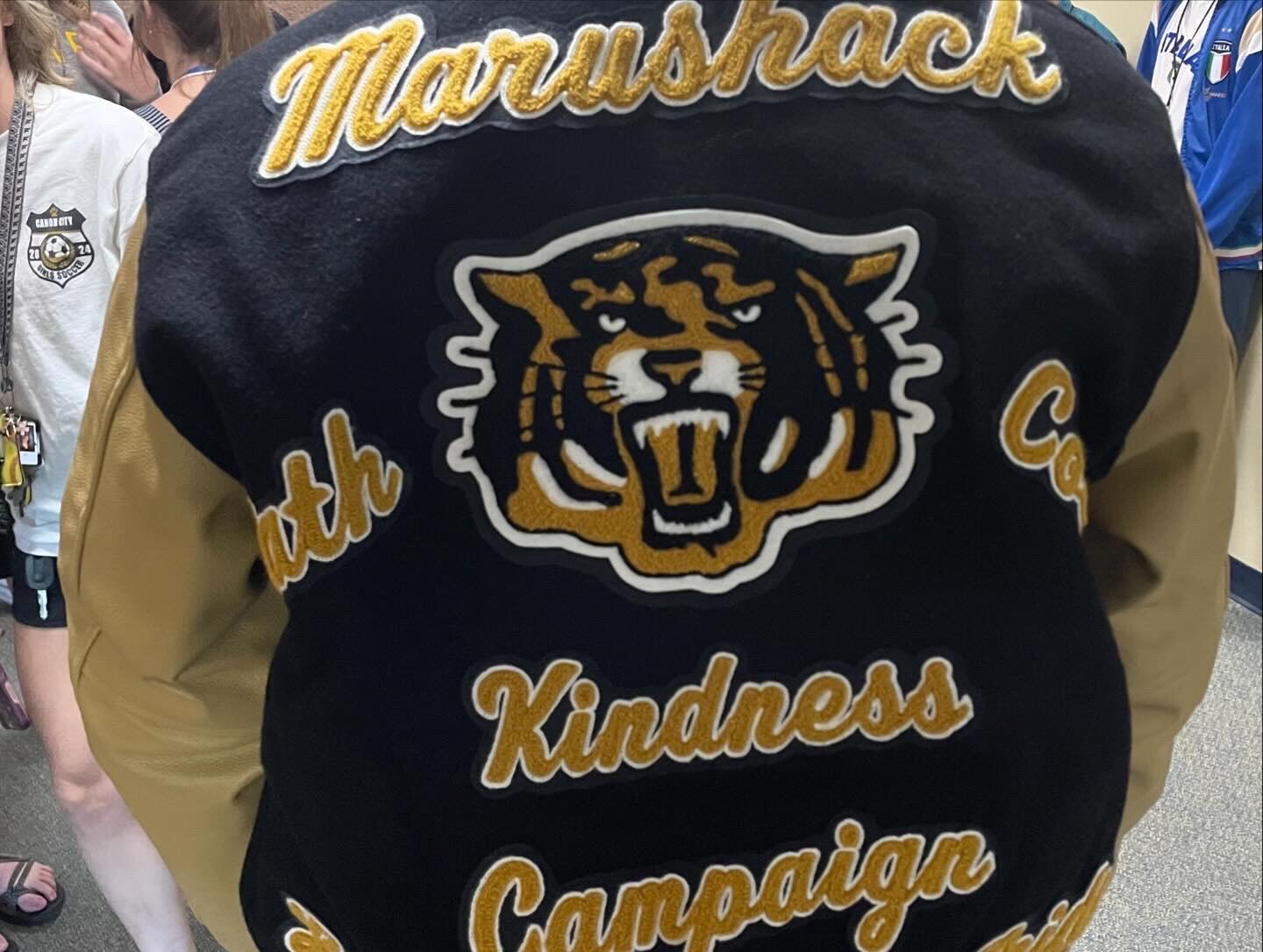 Back of Letter Jacket that says Marushack - Kindness Campaign